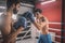 Young men fighting on a boxing ring and looking determined