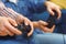 Young men having party indoors fun together playing game console close-up