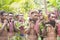 Young men playing panpipes, Solomon Islands