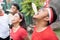 Young men and young women competing to spend crackers during the cracker eating contest