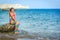 Young mermaid girl on tropical beach