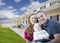 Young Military Family in Front of Beautiful House