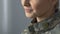 Young military woman smiling closeup dreaming of home, military occupation