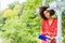 Young Mixed Race African American Woman traveling, relaxing at Central Park, New York City