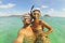 Young Mixed Race Couple Making Selfie Photo Using Waterproof Camera in Clear Ocean after Snorkeling. Phuket, Thailand.