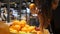 Young Mixed Race Woman Picking Oranges Fruit in Grocery Supermarket Shop. 4K.