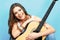 Young model girl with acoustic guitar