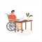 Young modern disabled man in wheelchair working at computer in comfortable office. Concept of diverse people employment