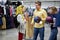 Young modern travellers choosing helmets for biking