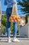 A young modern woman walking with fruits and vegetables