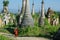 Young monk between stupas