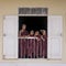 Young monks in window