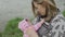 Young mother breast feeding her baby girl outdoors