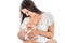Young mother breastfeeds her baby. Breast-feeding. White background