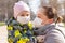 Young mother with daughter in protective masks. Covid-19 Coronavirus Pandemic, Virus Protection