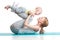 Young mother does fitness exercises together with baby boy isolated