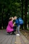 Young mother embraces her excited first class son on the way to school. Ready to study