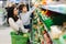 Young mother with her little baby boy at the supermarket. Healthy eating concept