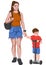 Young mother in jeans skirt and brown t-shirt holding hands with her son dressed in red and blue clothes while he is