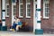 Young mother and son on railway station platform