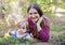 Young mother and toddler girl lying on the ground