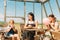 Young mother with two daughters enjoying sunny day