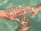 Young Mother and two sons watching starfish. Positive human emotions, feelings, joy. Funny cute child making vacations and