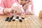 Young mothers teach their children to play go