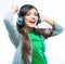 Young motion woman with headphones listening music .Music teena