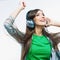 Young motion woman with headphones listening music .Music teena