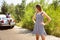 Young multiethnic international couple traveling on the car in sunny day