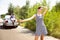 Young multiethnic international couple traveling on the car in sunny day