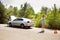 Young multiethnic international couple traveling on the car in sunny day