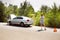 Young multiethnic international couple traveling on the car in sunny day