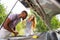 Young multiethnic international couple traveling on the car in sunny day