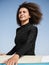 Young multiracial surfer woman portrait