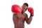 Young muscular man with boxing gloves