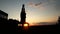 Young muscular man in tank top doing hand stand at