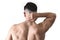 Young muscular sport man holding sore neck massaging cervical area suffering body pain