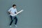 Young musician looking concentrated while playing the guitar