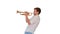 Young musician playing the trumpet on white background.