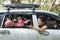 Young muslim family , transport, leisure, road trip and people concept