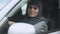 Young Muslim lady preparing to drive, business lady going to meeting, license