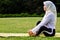 Young Muslim woman doing muscle stretching before doing yoga moves