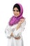 Young muslim woman lifestyle wearing purple scarf standing with beautiful smile