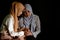 Young muslim women sitting and hold her friend hand as a console. Friends are together when someone having a life issue or problem