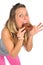 Young naughty woman eating chocolate donut happy guilty for unhealthy nutrition