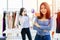 Young new SME business owner happy and successful teen portrait with fashion clothing shop background