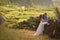 Young newly wedded couple in honneymoon on Flores island, Azores