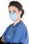 Young nurse, blue scrubs, mask, stethoscope